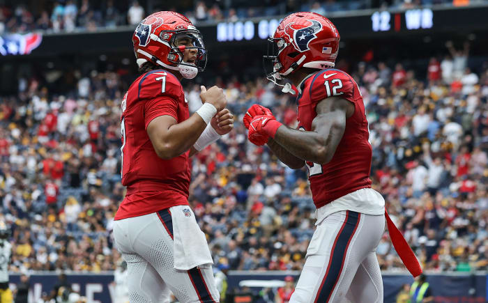 Houston Texans quarterback C.J. Stroud (7) and wide receiver Nico Collins (12) celebrate after a touchdown against the Pittsburgh Steelers at NRG Stadium Sunday. The Texans won 30-6.